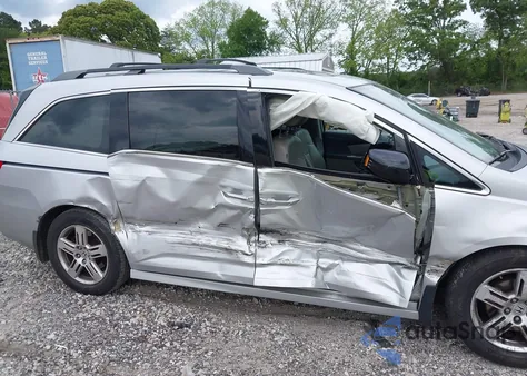 2012 Honda Odyssey Touring/Touring Elite z USA, uszkodzony, nr VIN 5FNRL5H90CB083157